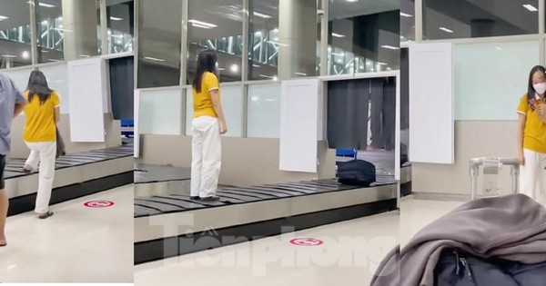 Cục Hàng không sẽ xử lý nghiêm nữ khách đứng lên băng chuyển hành lý sân bay - Ảnh 1.