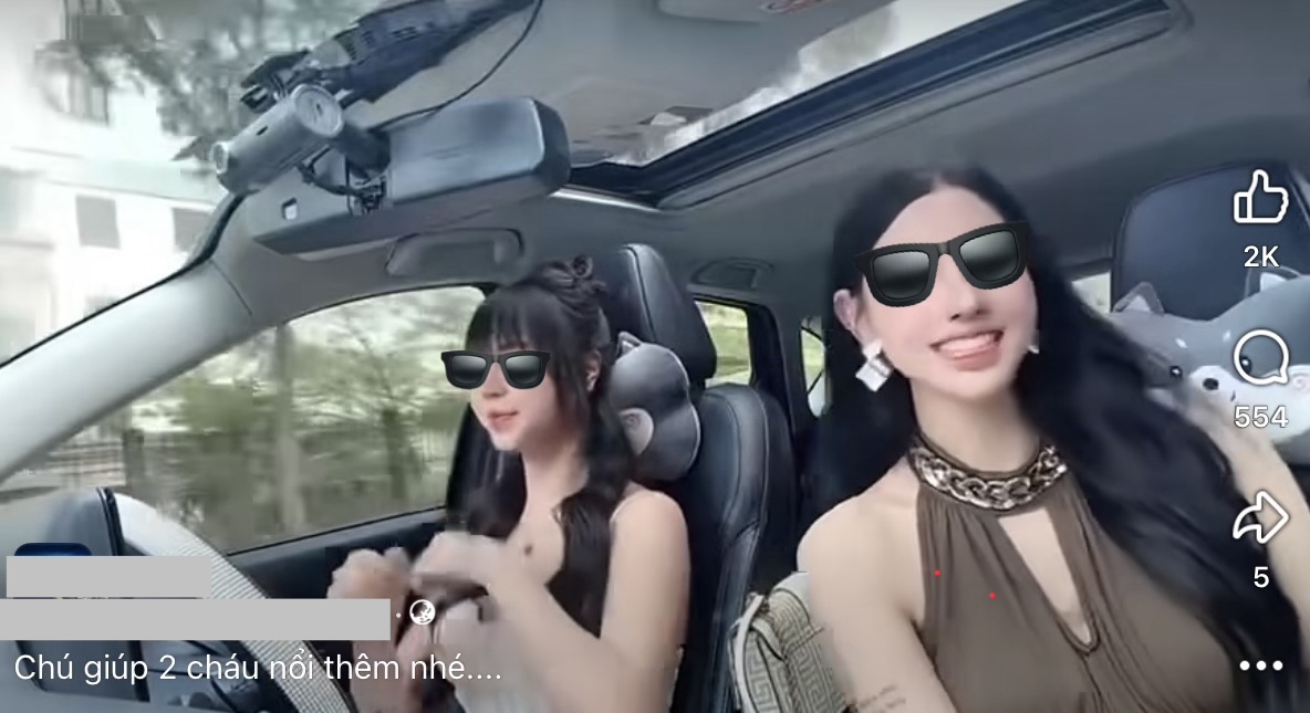 Hết mình với TikTok, hai cô gái "diễn xiếc" trong ô tô bất chấp nguy hiểm, netizen thở dài ngao ngán- Ảnh 1.