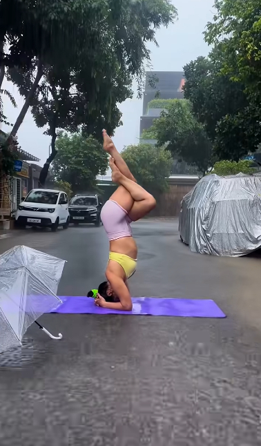Tập Yoga dưới mưa, đoạn video ngắn của hot girl bất ngờ lan truyền gây tranh cãi- Ảnh 4.