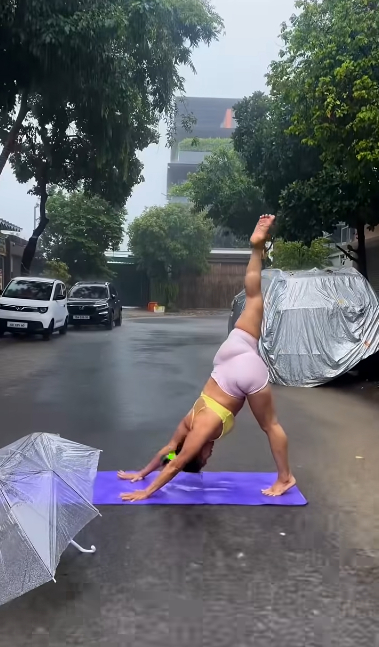 Tập Yoga dưới mưa, đoạn video ngắn của hot girl bất ngờ lan truyền gây tranh cãi- Ảnh 5.
