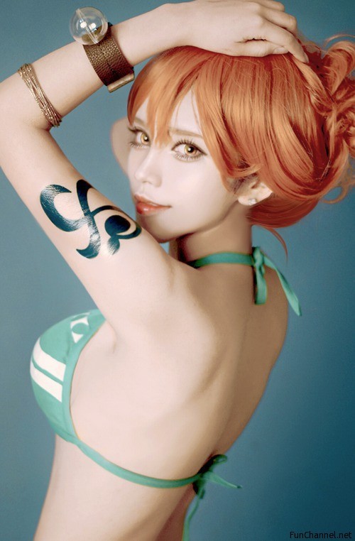 Bỏng mắt với những hình ảnh cosplay miêu tặc Nami trong One Piece khiến các fan đứng ngồi không yên - Ảnh 4.