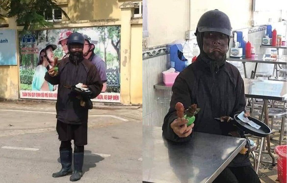 Công an truy tìm ninja đen cầm đầu gà, xúc xích đi xin tiền ở Hà Nội - Ảnh 1.