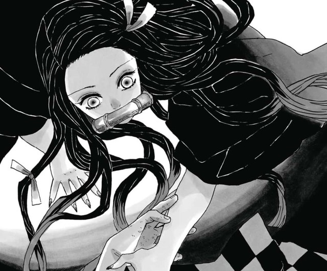 Kimetsu no Yaiba: Vì sao Nezuko sau khi hóa quỷ luôn phải ngậm ống tre? - Ảnh 2.