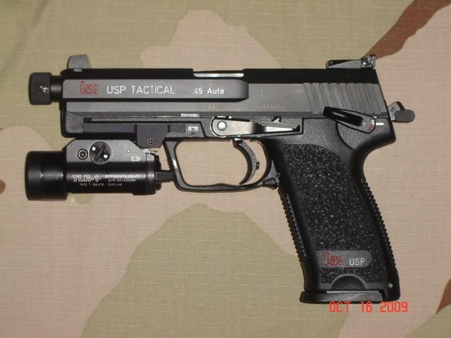 H&K USP: Mẫu súng ngắn xuất sắc của người Đức, đối thủ khó ưa của khẩu Glock - Ảnh 4.