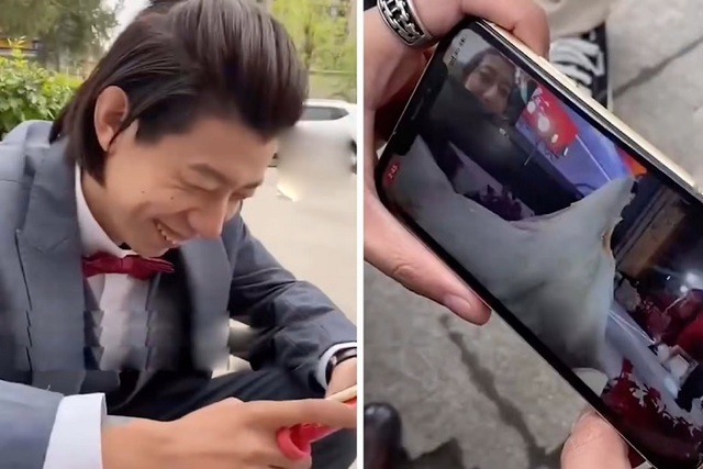 Banned from entering the wedding ceremony, the groom laughed happily watching his own wedding livestream from afar, fans were curious to find out why it was so fun - Photo 1.