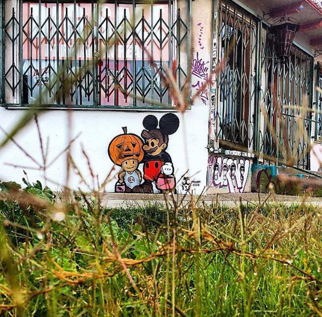 Mãn nhãn với loạt tranh nghệ thuật đường phố mang phong cách tương phản giữa phim hoạt hình và thế giới thực