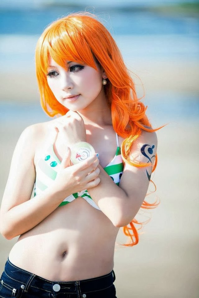 Bỏng mắt với những hình ảnh cosplay miêu tặc Nami trong One Piece khiến các fan đứng ngồi không yên - Ảnh 12.