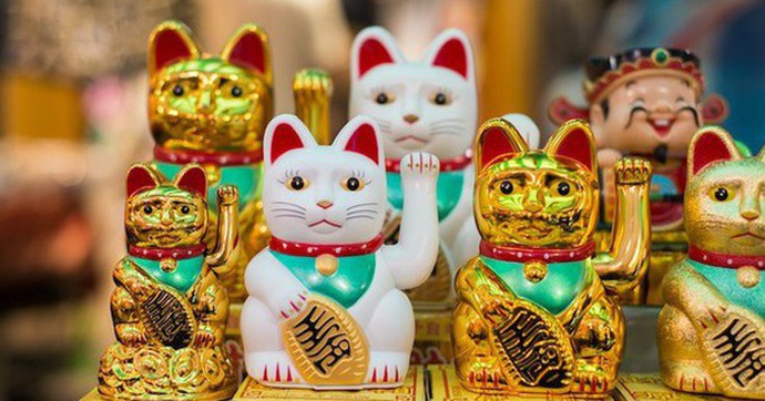 Câu chuyện thú vị về nguồn gốc ra đời tượng mèo Maneki-neko may mắn nổi tiếng của Nhật Bản