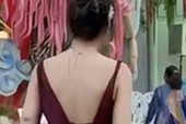 Diện váy ngắn, đầm hở lưng, thợ make-up gây xôn xao, bị cho là cố tình "tranh spotlight"