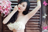 Hot girl Nu Phạm khoe ảnh với bộ bikini tết bằng hoa