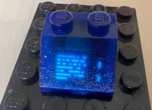 Ngỡ ngàng máy tính mini bên trong nút Lego, có cả màn hình OLED