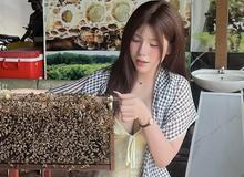 Khoác khăn rằn đi xuồng ba lá, "hot girl pizza" lại gây bão, sắc vóc nóng bỏng