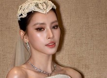 Tiểu Vy hóa cô dâu đẹp như bước ra từ cổ tích, visual tuổi 26 khiến netizen không rời mắt