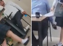 Phẫn nộ khoảnh khắc thầy giáo cầm sẵn điện thoại để chụp lén dưới váy nữ sinh khi kiểm tra bài tập