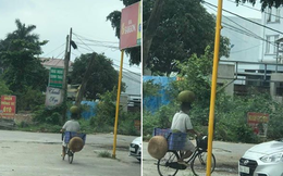 Phát hiện "cao thủ" đầu đội mít siêu to khổng lồ, chân đạp xe cực lụa khiến cộng đồng mạng trầm trồ "Người thông minh phải biết sử dụng cái đầu"