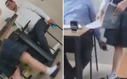 Phẫn nộ khoảnh khắc thầy giáo cầm sẵn điện thoại để chụp lén dưới váy nữ sinh khi kiểm tra bài tập