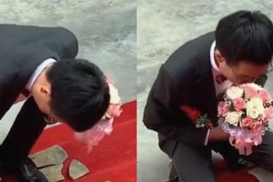 Chàng trai bị bắt quỳ gối cho bể gạch ngói mới được rước dâu, nhìn bộ dạng của chú rể dân mạng liền chỉ trích