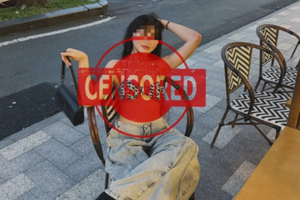 Ăn mặc hở hang giữa phố đông người, hot girl lập tức nhận vô số chỉ trích