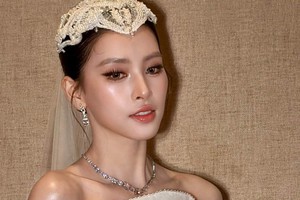 Tiểu Vy hóa cô dâu đẹp như bước ra từ cổ tích, visual tuổi 26 khiến netizen không rời mắt