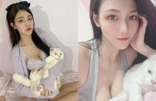 Khoe dáng gợi cảm trên giường nhưng nàng hot girl lại bị CĐM "bỏ rơi" khi chỉ khen chú mèo cưng chụp cùng