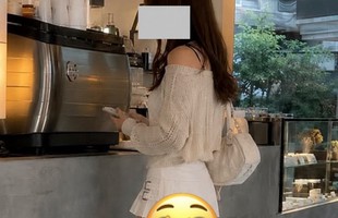 Mặc váy ngắn đi cà phê nhưng gặp sàn nhà bằng gương, cô gái tạo nên tranh cãi "nóng" trên mạng xã hội