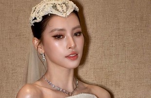 Tiểu Vy hóa cô dâu đẹp như bước ra từ cổ tích, visual tuổi 26 khiến netizen không rời mắt