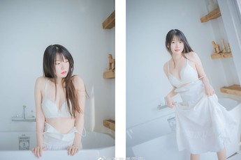 Say lòng hình ảnh thiếu nữ diện váy trắng dịu dàng, e ấp những ngày tết gần kề