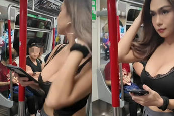 Hot girl diện áo xẻ sâu lên tàu điện ngầm gây chú ý, biểu tượng của "người qua đường" khiến CĐM xôn xao